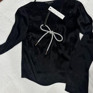Central Park West Black Long Sleeve Blouse with Silver Accent